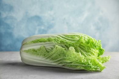 Photo of Fresh ripe cabbage on table