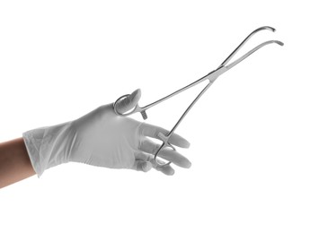 Photo of Doctor holding surgical forceps on white background, closeup. Medical instrument