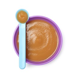 Photo of Delicious baby food in bowl and spoon isolated on white, top view
