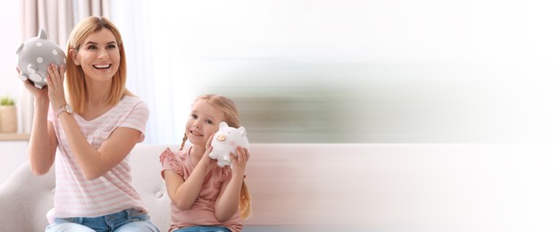Image of Mother and daughter with piggy banks at home, space for text. Banner design