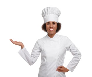 Photo of Portrait of happy female chef in uniform on white background