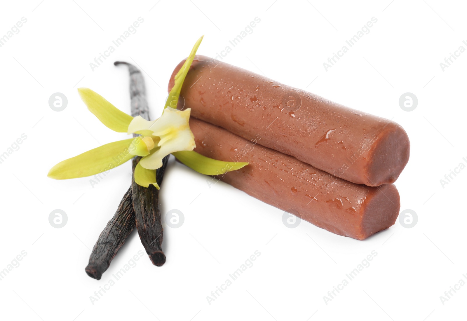 Photo of Glazed curd cheese bars, vanilla pods and flower isolated on white