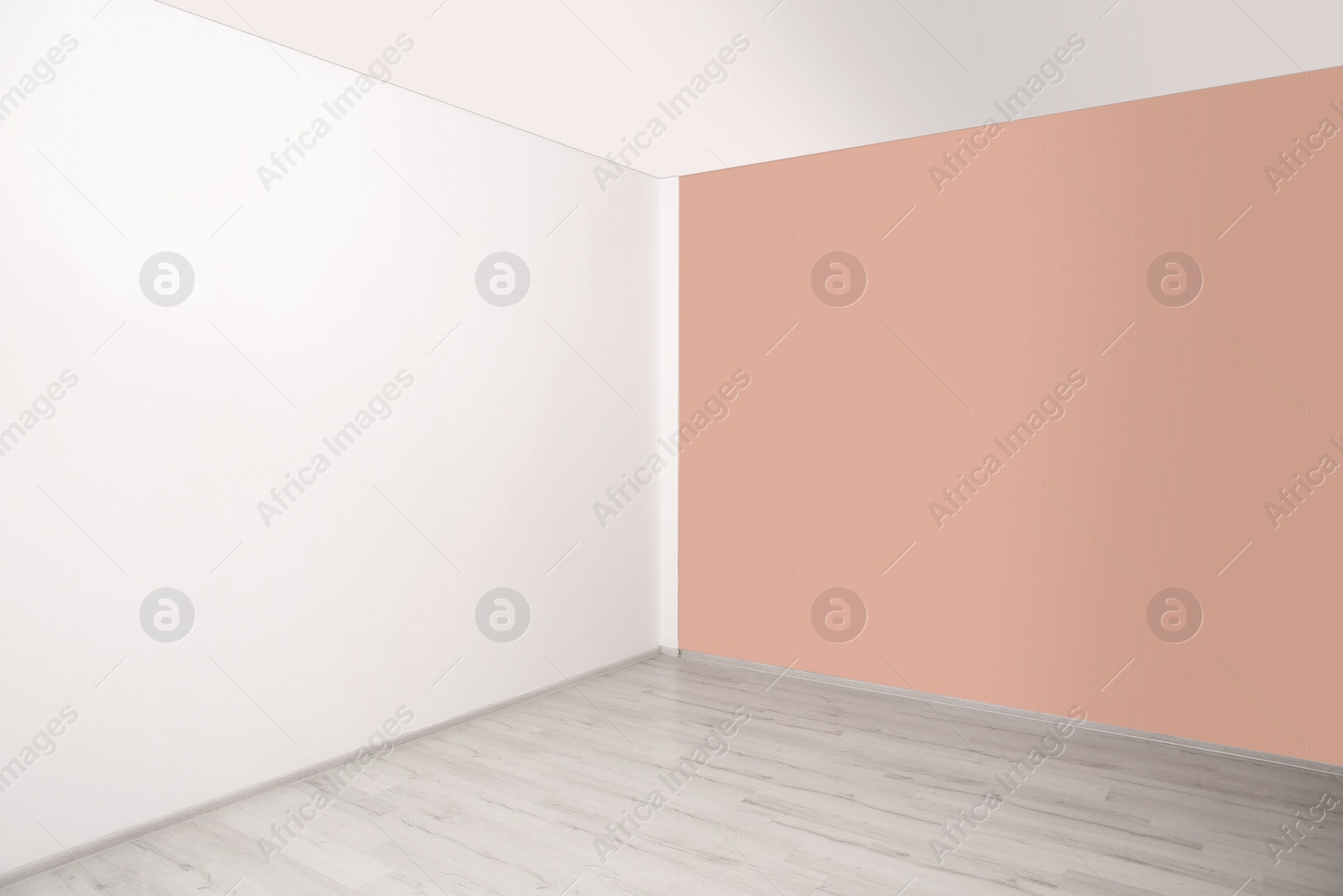 Photo of Empty room with different walls and laminated floor