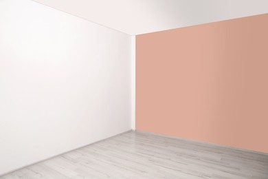 Empty room with different walls and laminated floor