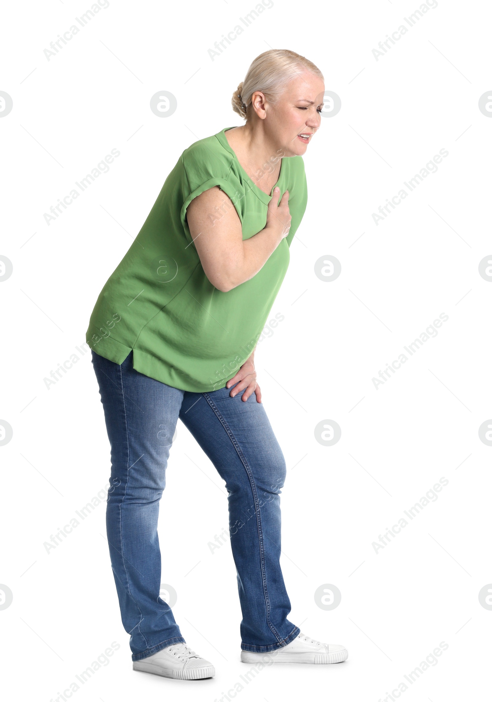 Photo of Mature woman having heart attack on white background