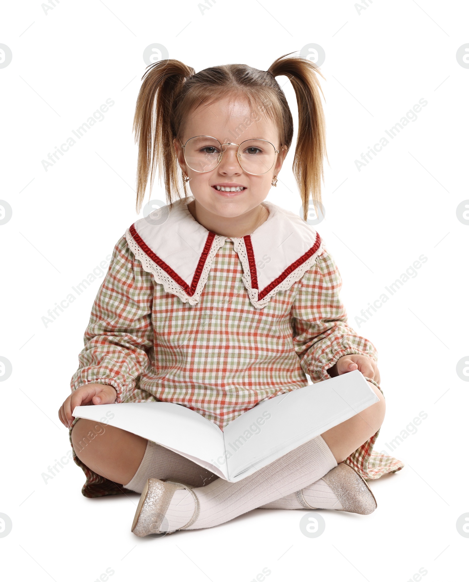 Photo of Cute little girl with book on white background