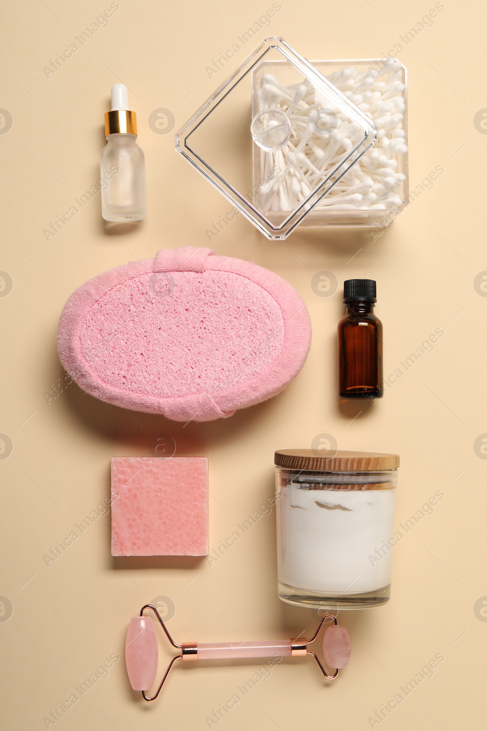 Photo of Bath accessories. Flat lay composition with personal care products on beige background