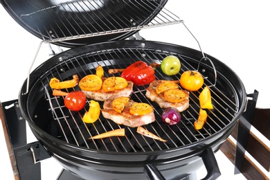 Photo of Modern barbecue grill with tasty food on white background