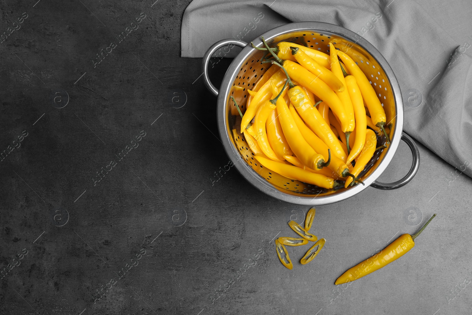 Photo of Flat lay composition with chili peppers on grey background