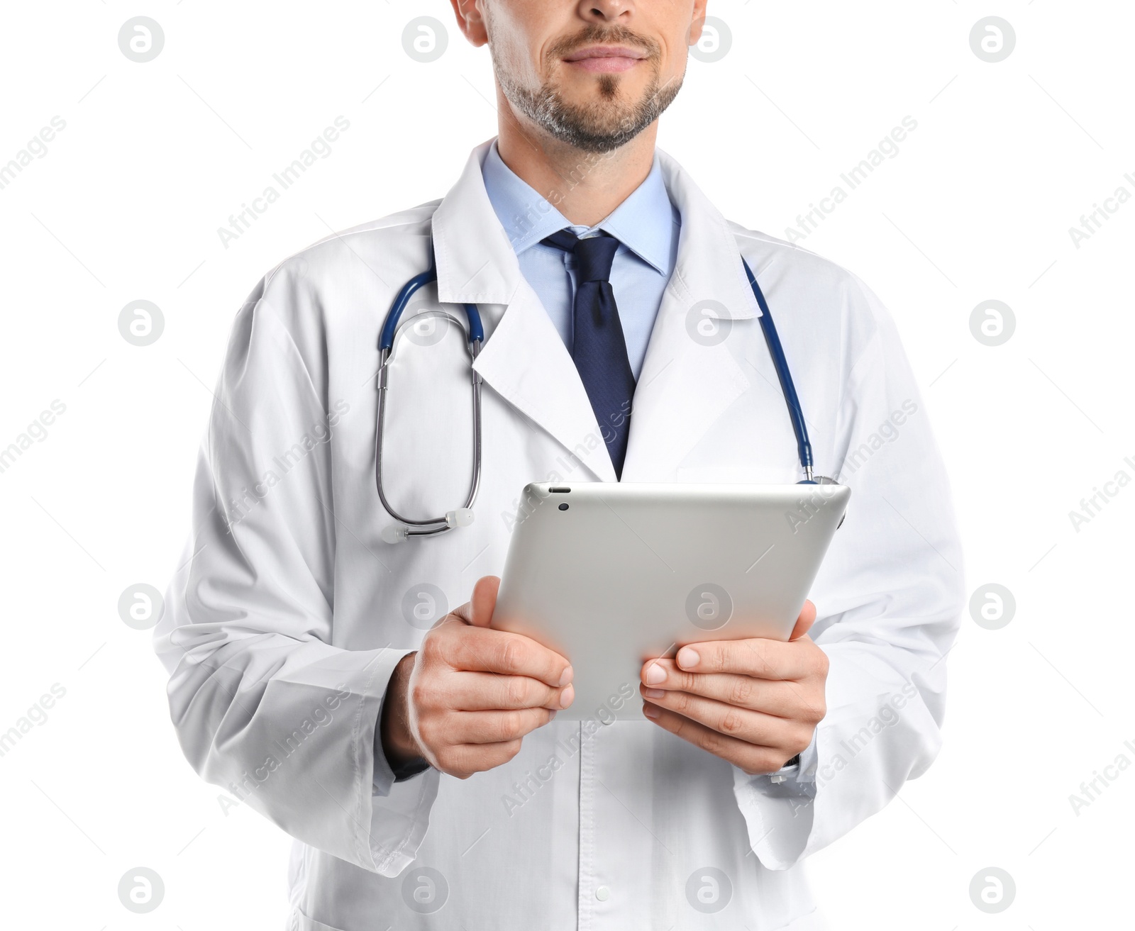 Photo of Male doctor holding modern tablet on white background, closeup