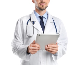 Photo of Male doctor holding modern tablet on white background, closeup