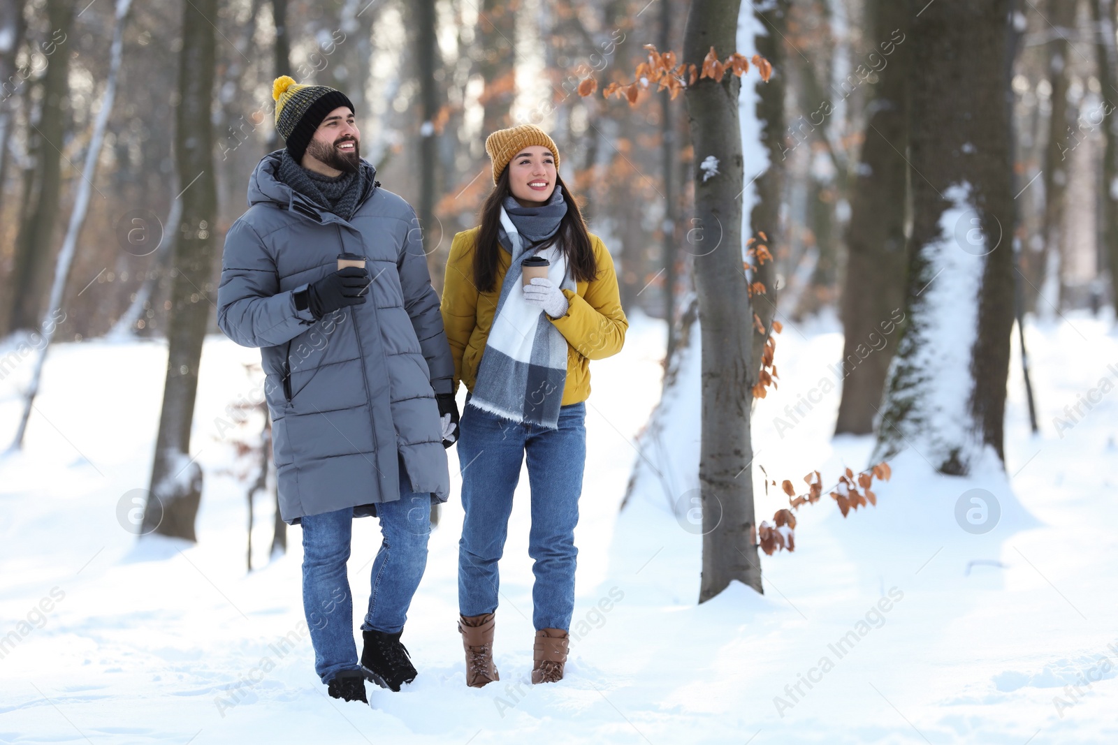 Photo of Beautiful young couple enjoying winter day outdoors