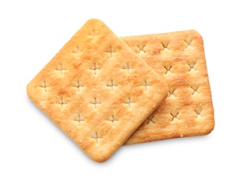 Photo of Delicious crispy crackers isolated on white, top view