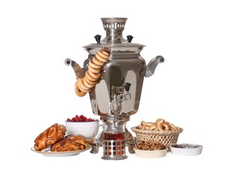 Photo of Traditional Russian samovar with treats isolated on white