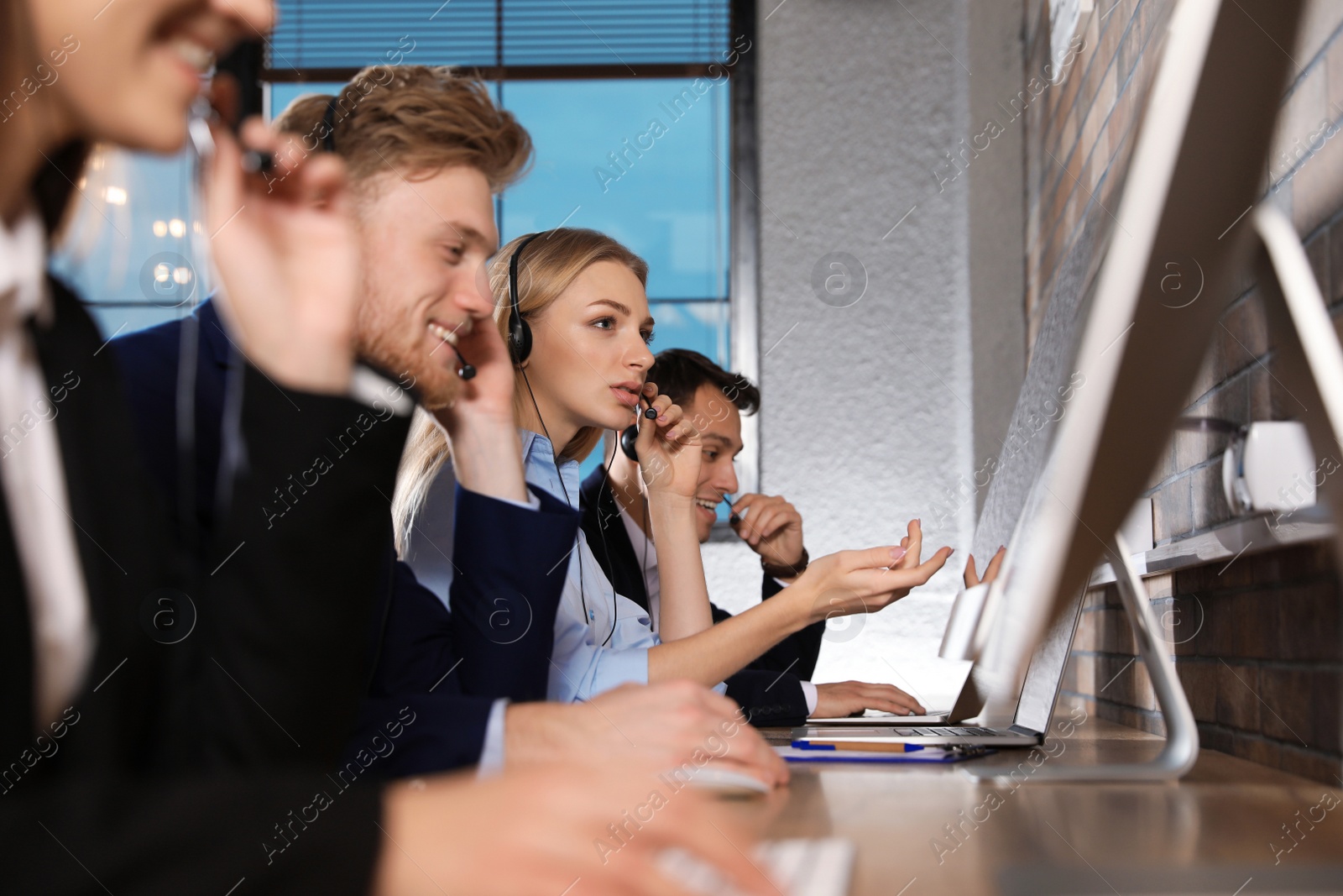 Photo of Technical support team working in modern office