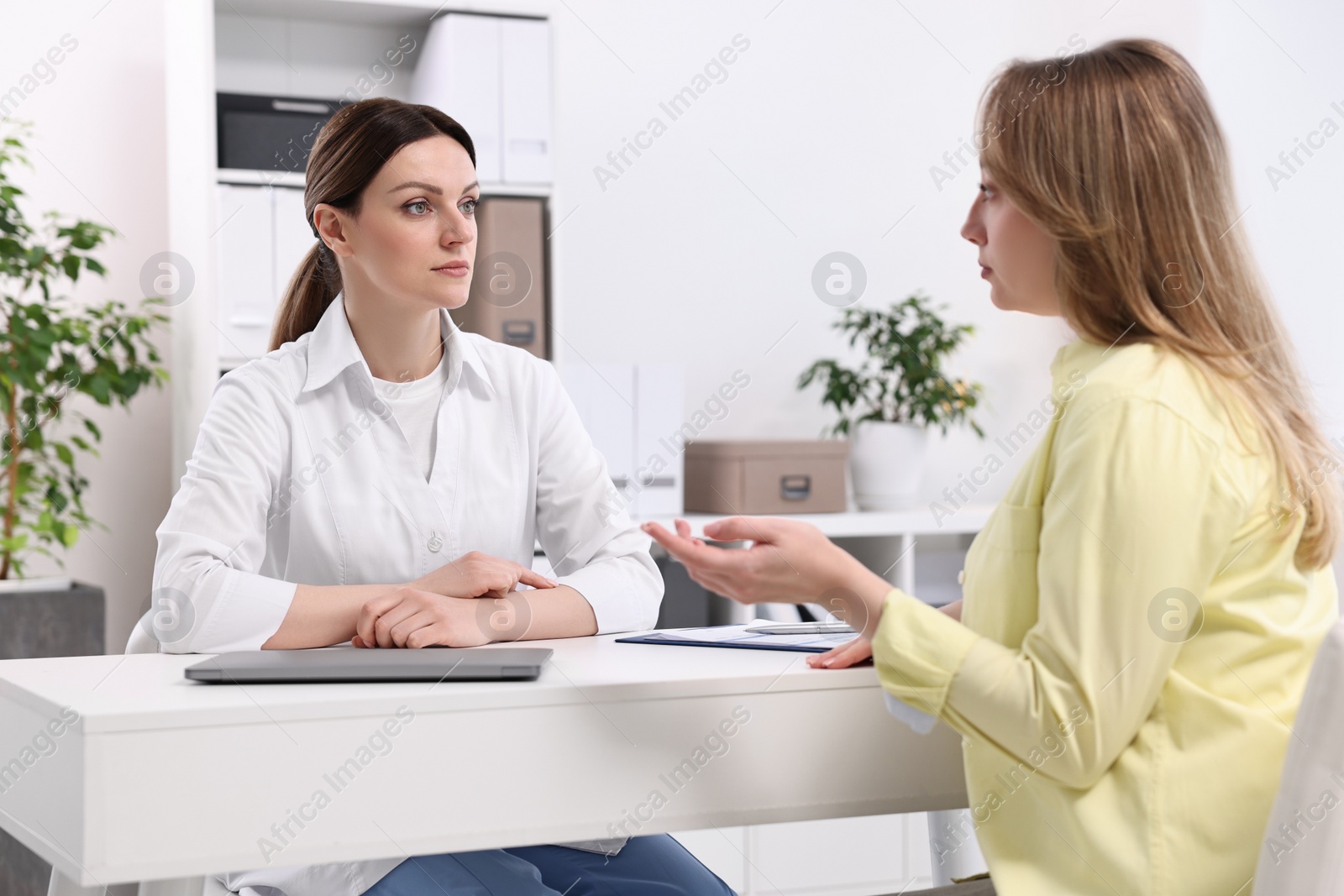 Photo of Mammologist's appointment. Doctor and woman in hospital