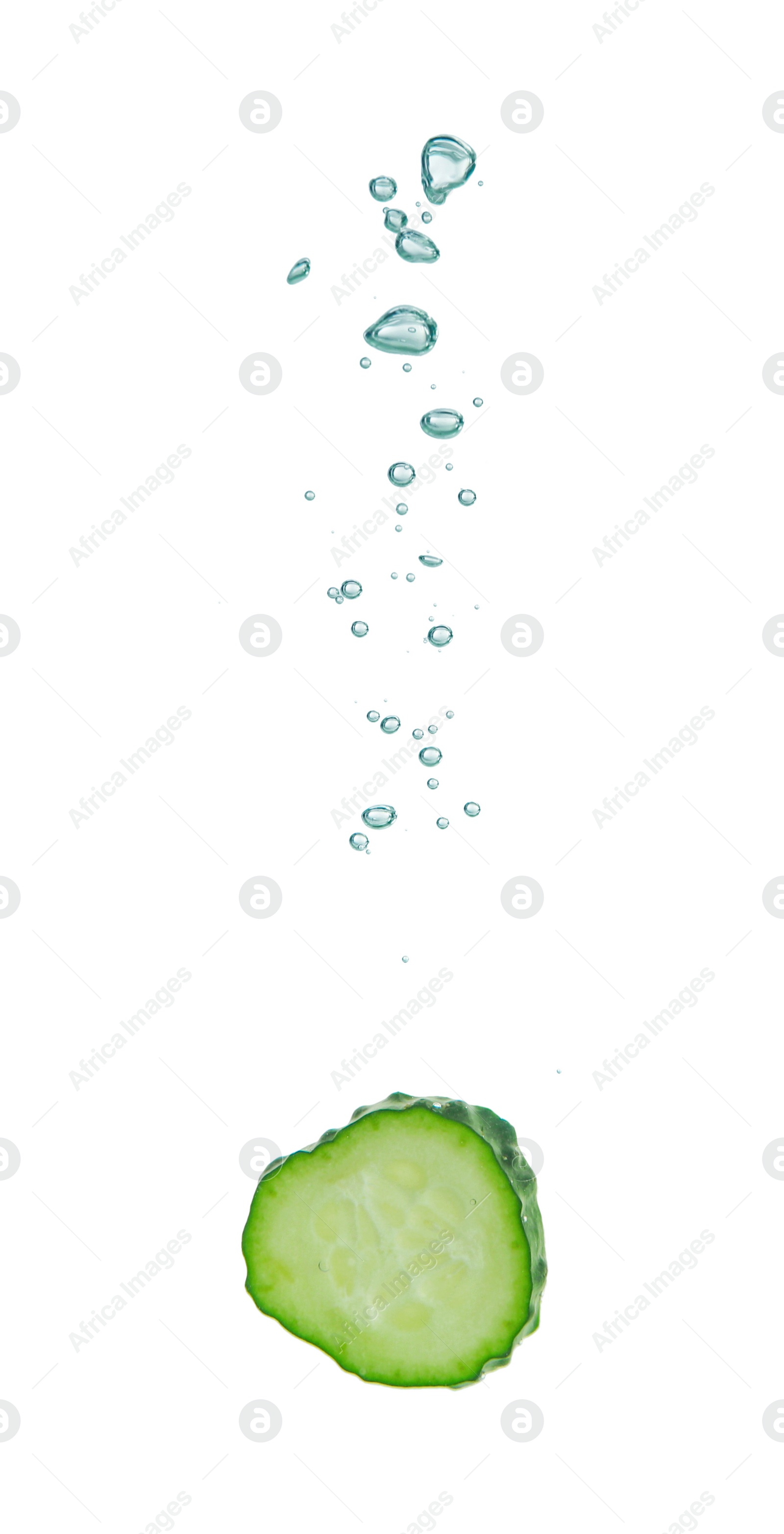 Photo of Fresh cucumber slice in water on white background