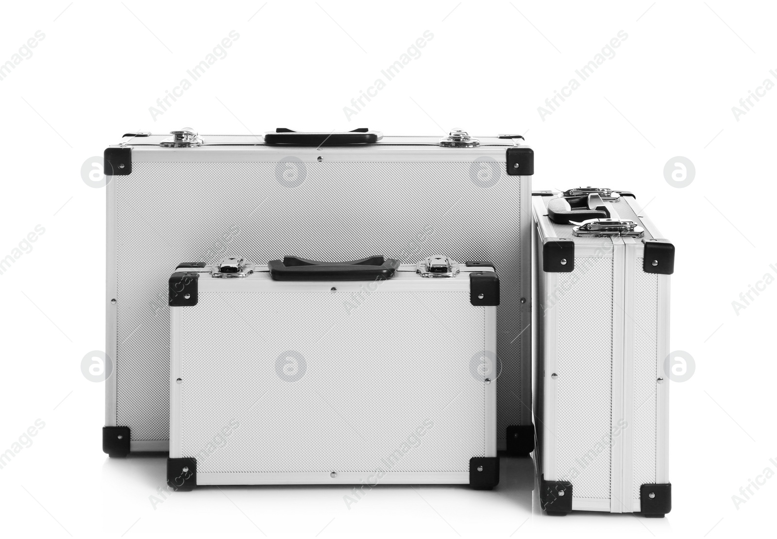 Photo of Set of modern suitcases on white background