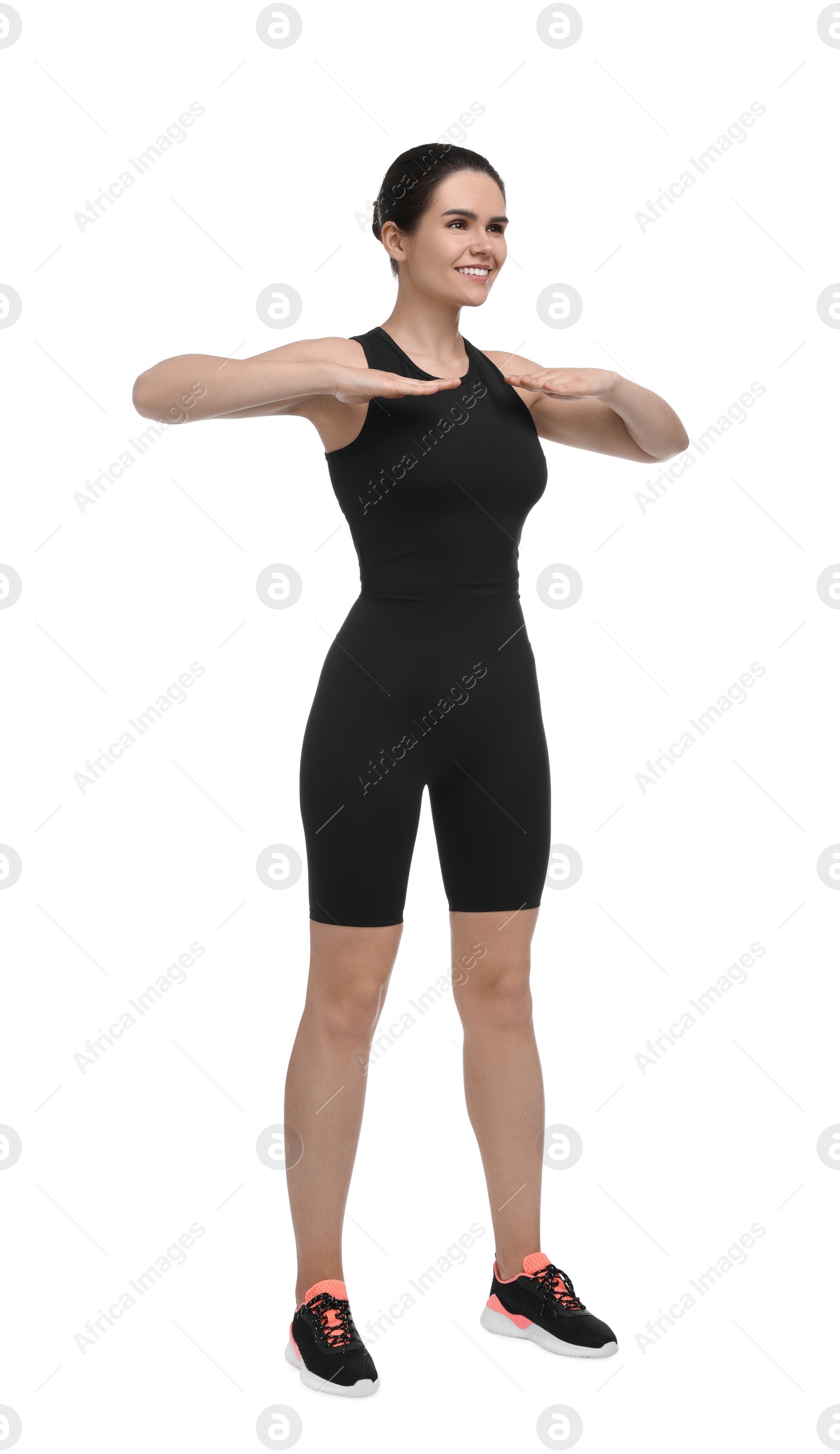 Photo of Happy woman doing morning exercise on white background