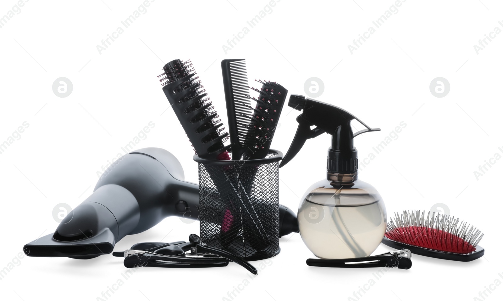 Photo of Different professional hairdresser tools on white background