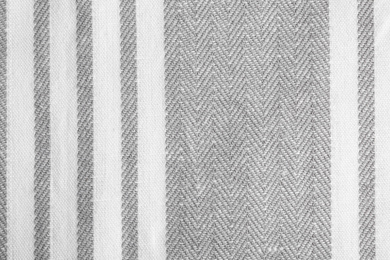 Photo of Texture of grey striped fabric as background, closeup