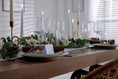 Festive table setting with beautiful tableware and decor indoors