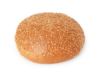 One fresh hamburger bun with sesame seeds isolated on white