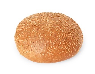 Photo of One fresh hamburger bun with sesame seeds isolated on white