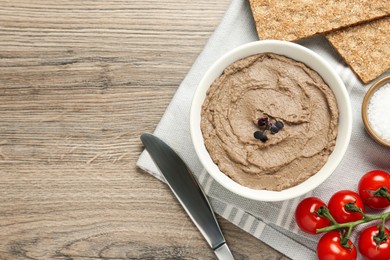 Photo of Flat lay composition with tasty liver pate on wooden table. Space for text