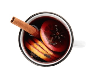 Photo of Mug of mulled wine with spices isolated on white, top view