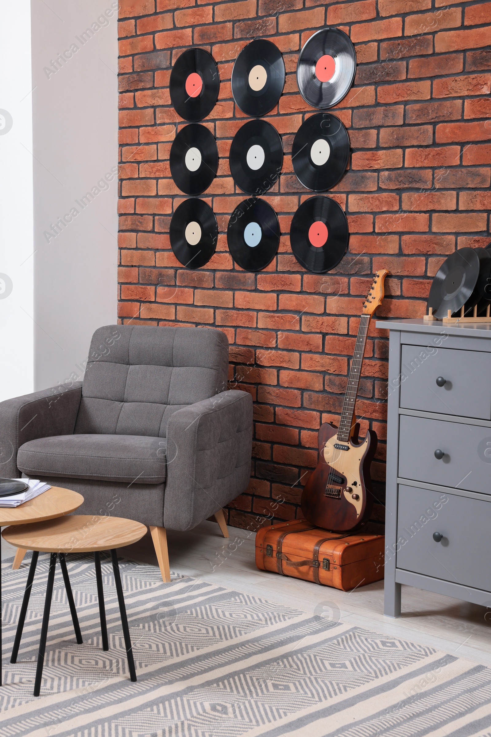 Photo of Living room decorated with vinyl records. Interior design