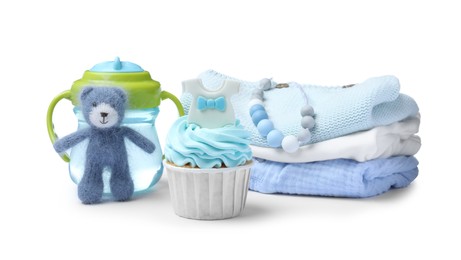 Beautifully decorated baby shower cupcake for boy, clothes and accessories on white background