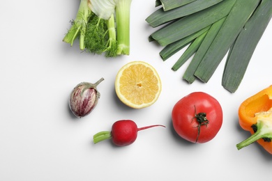 Photo of Flat lay composition with fresh ripe vegetables on white background