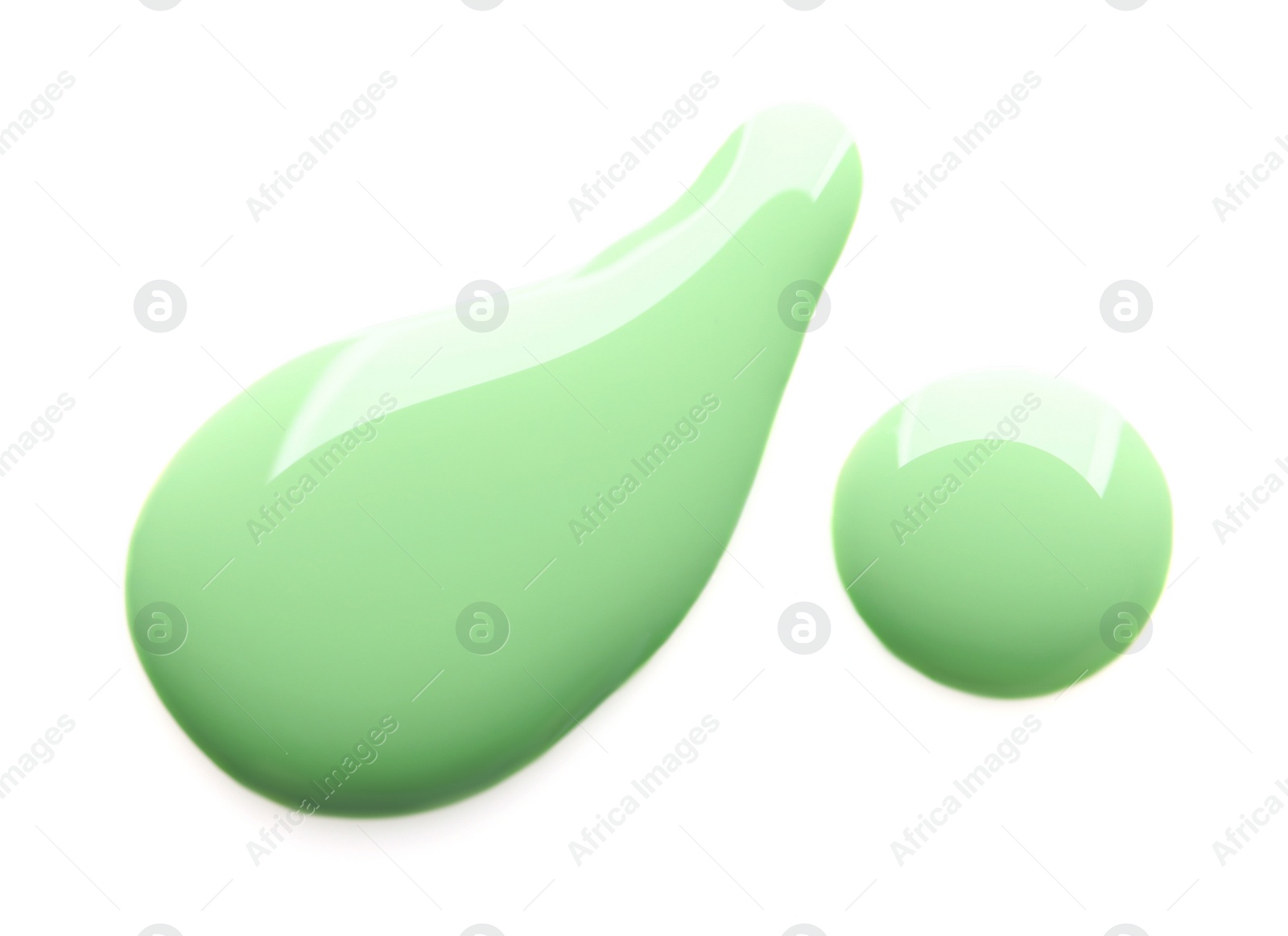 Photo of Spilled nail polish on white background, top view