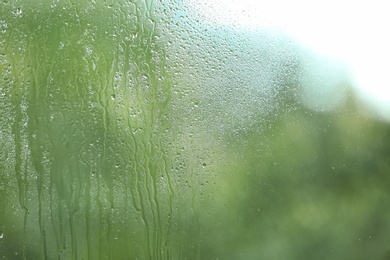 View of glass with water drops, closeup