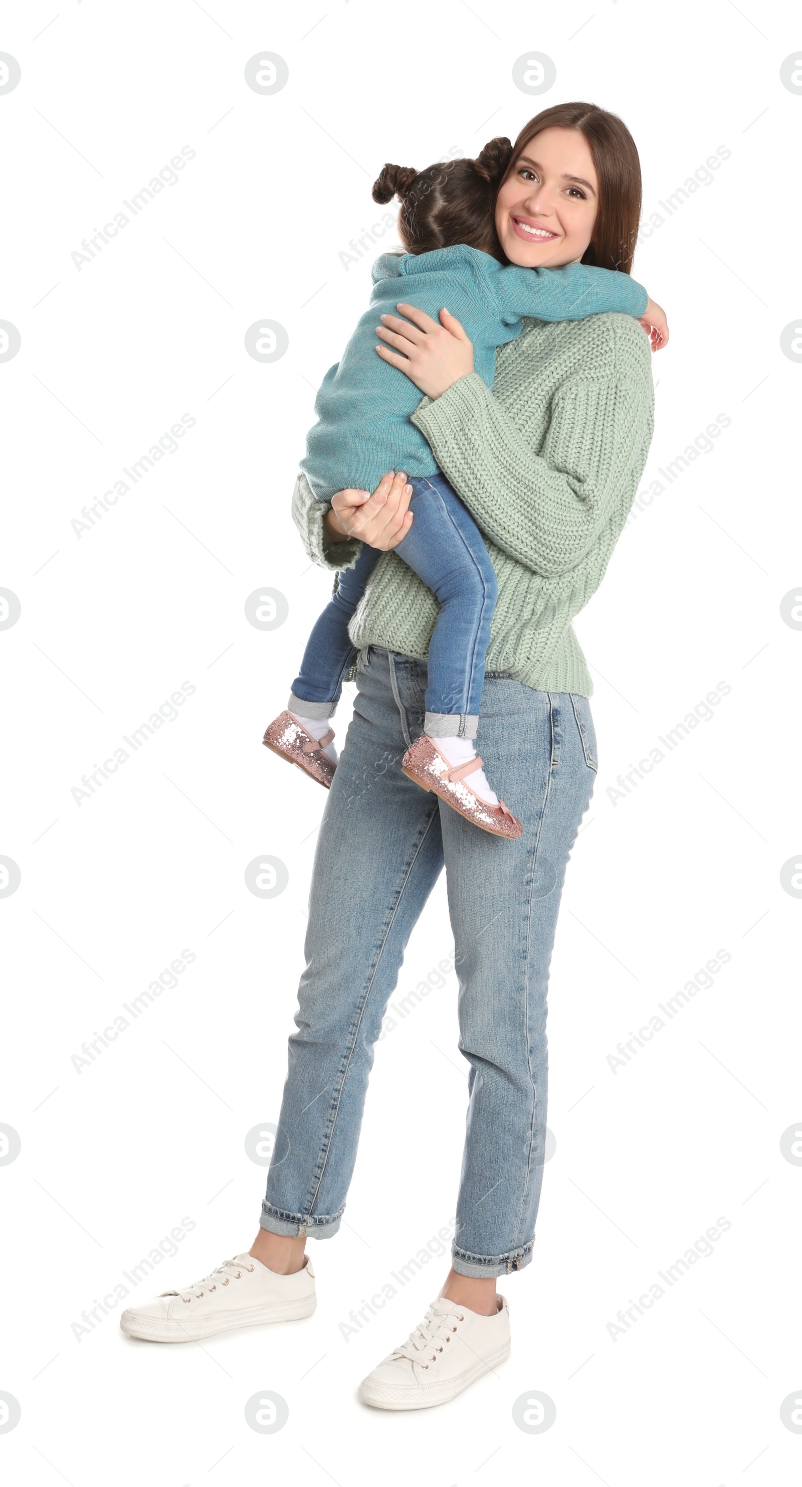 Photo of Young mother with little daughter on white background