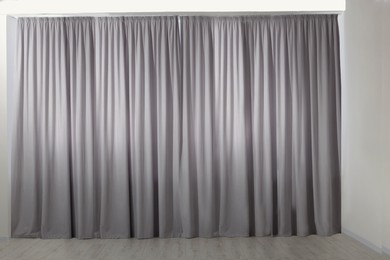 Light grey window curtains in living room