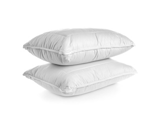 Clean soft bed pillows on white background