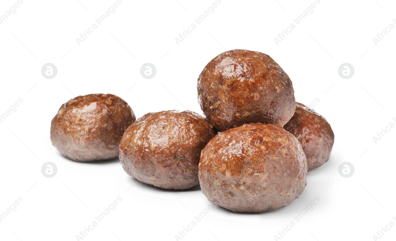 Photo of Many tasty cooked meatballs on white background