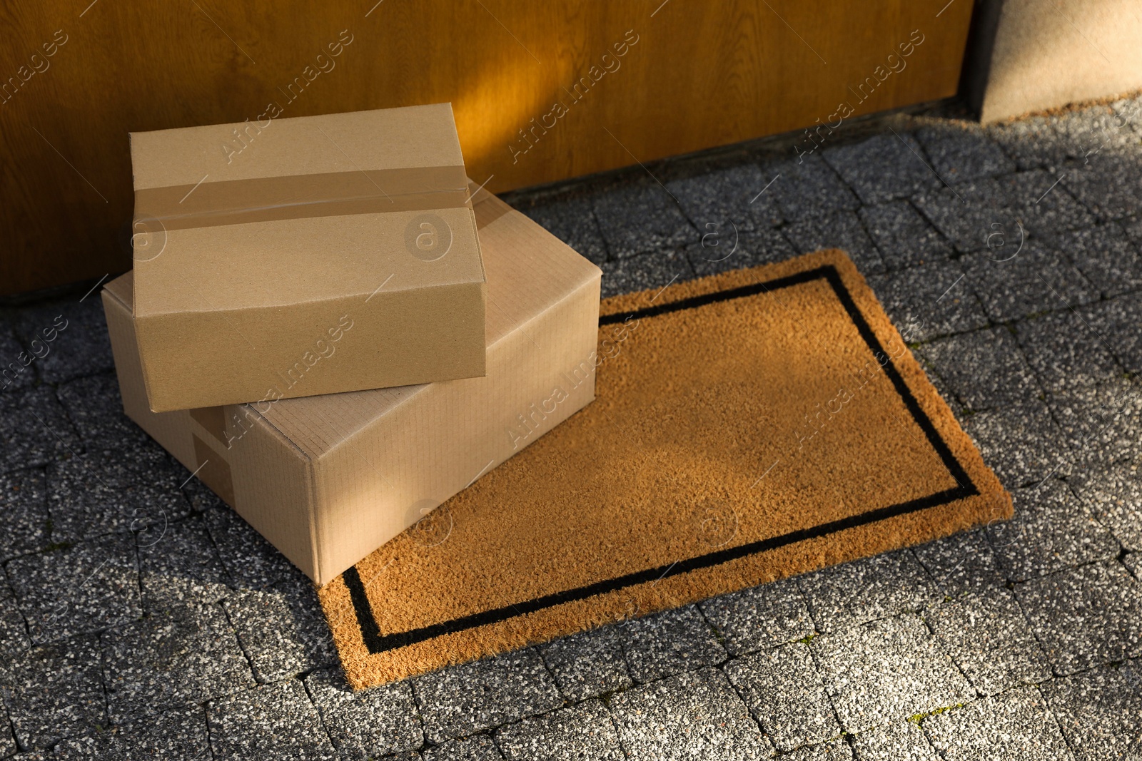 Photo of Stack of parcels delivered near front door