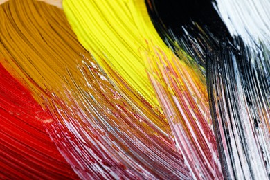 Photo of Abstract colorful acrylic paint as background, closeup view