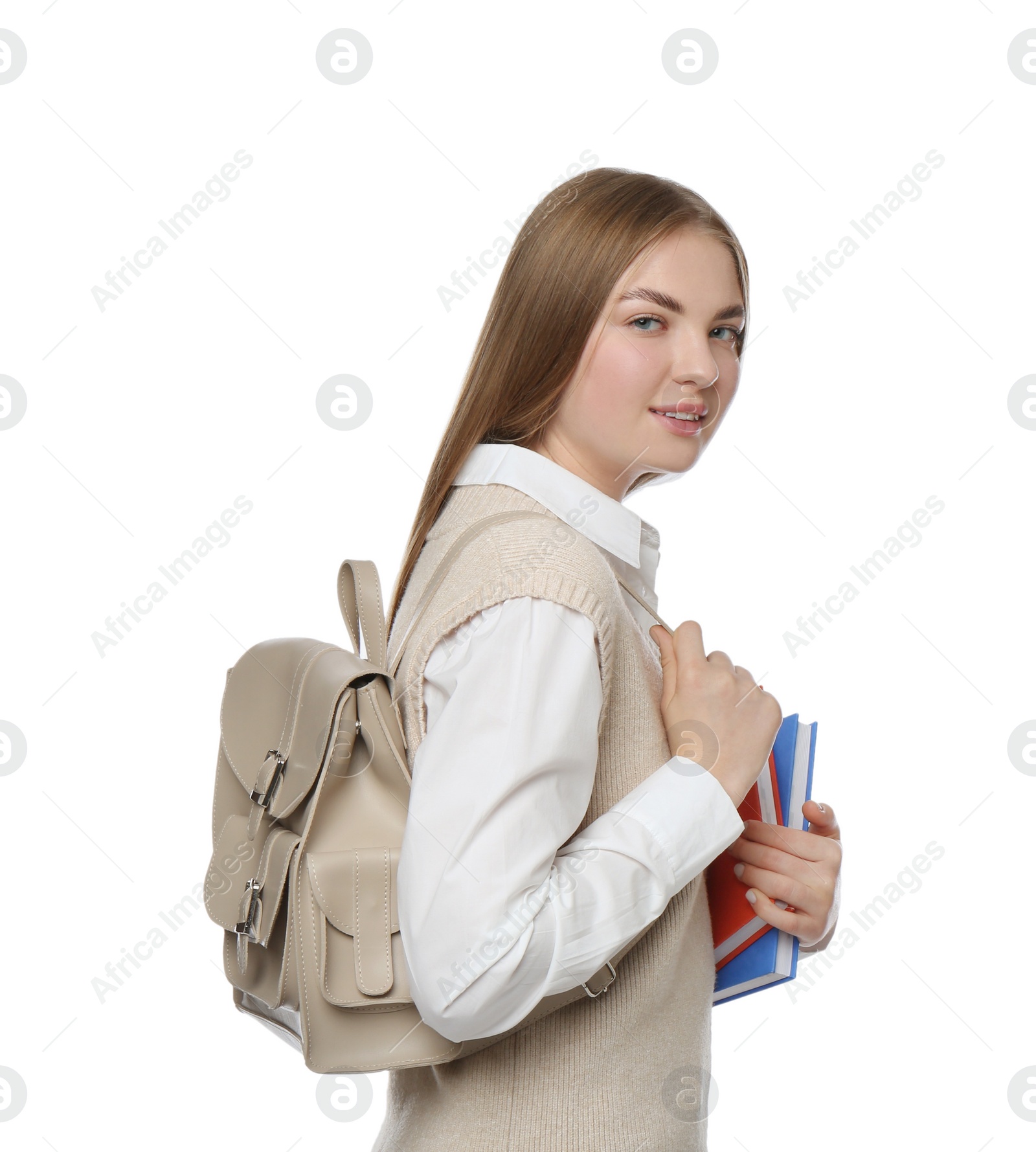 Photo of Teenage student with backpack and books on white background