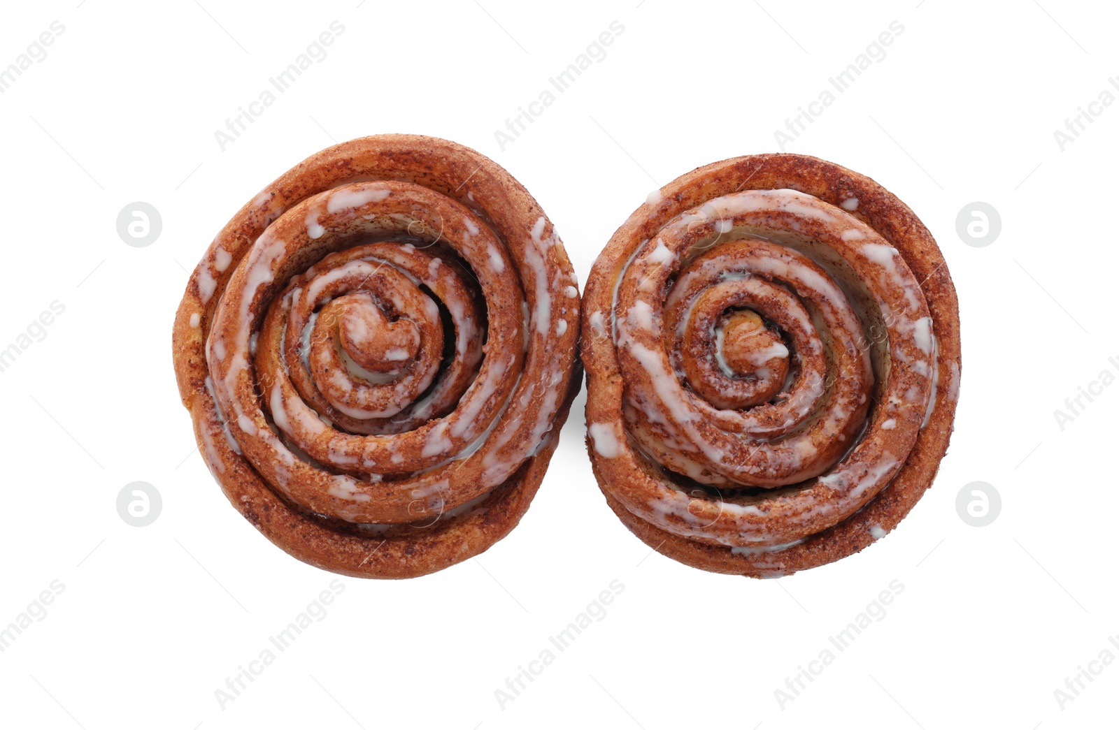 Photo of Two tasty cinnamon rolls isolated on white, top view