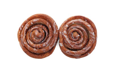 Two tasty cinnamon rolls isolated on white, top view