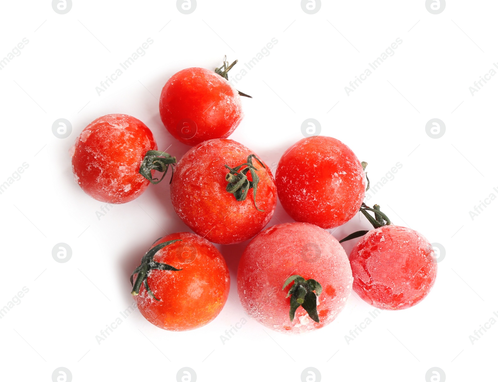 Photo of Frozen tomatoes isolated on white, top view. Vegetable preservation