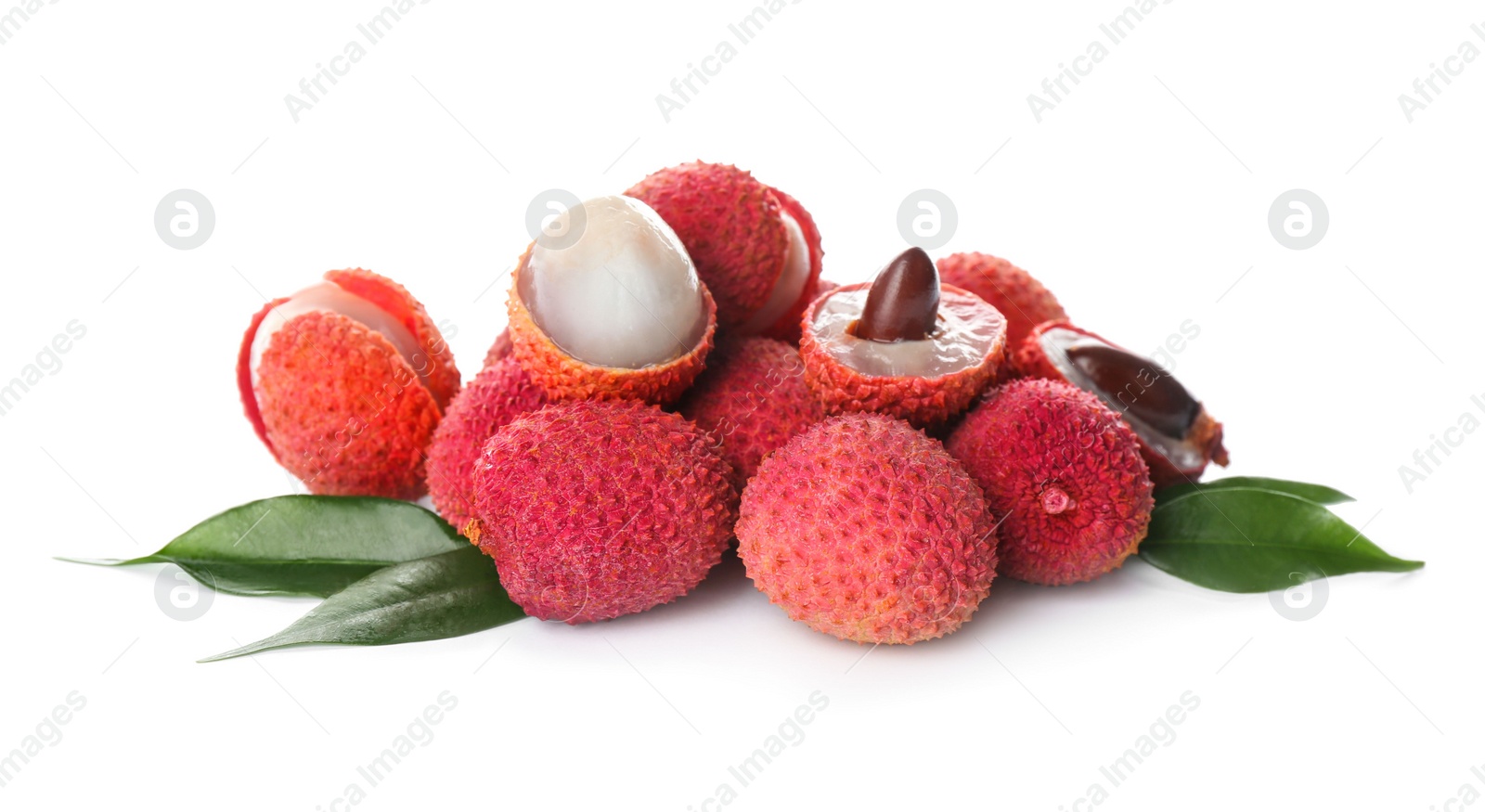 Photo of Pile of fresh ripe lychees with green leaves on white background