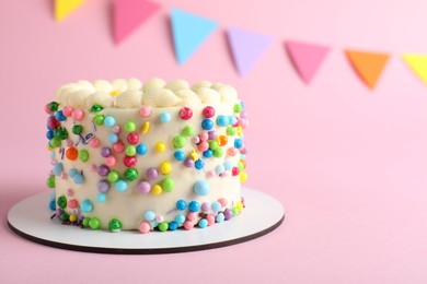 Cute bento cake with tasty cream on pink background, space for text