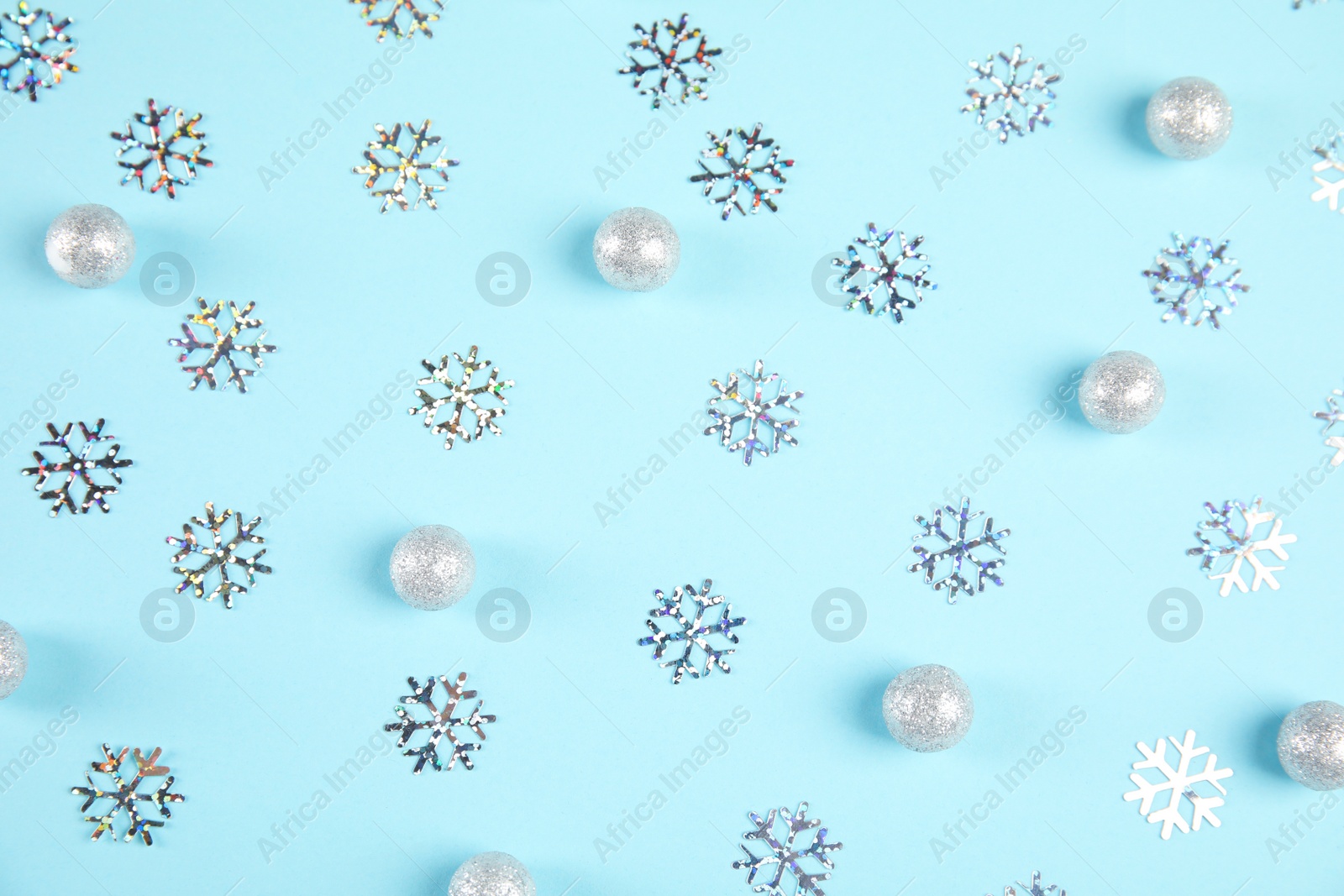 Photo of Flat lay composition with Christmas decor on blue background