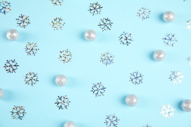 Photo of Flat lay composition with Christmas decor on blue background