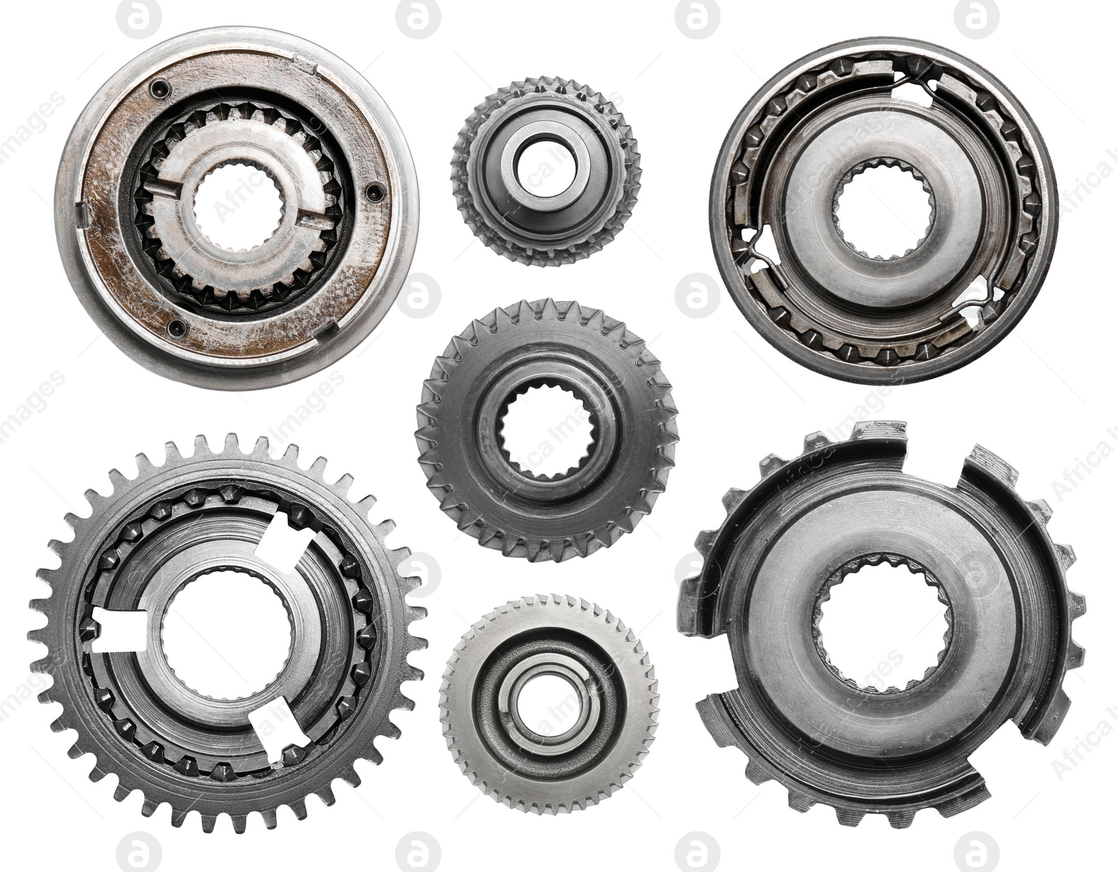 Image of Set with different stainless steel gears on white background, top view